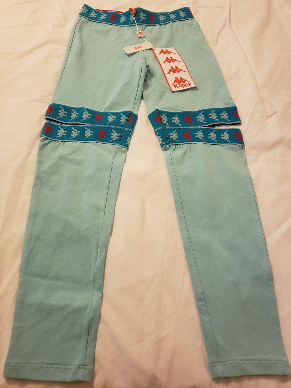 Kappa Kids Aqua Joggers with Teal Logo Tape and Red Accents